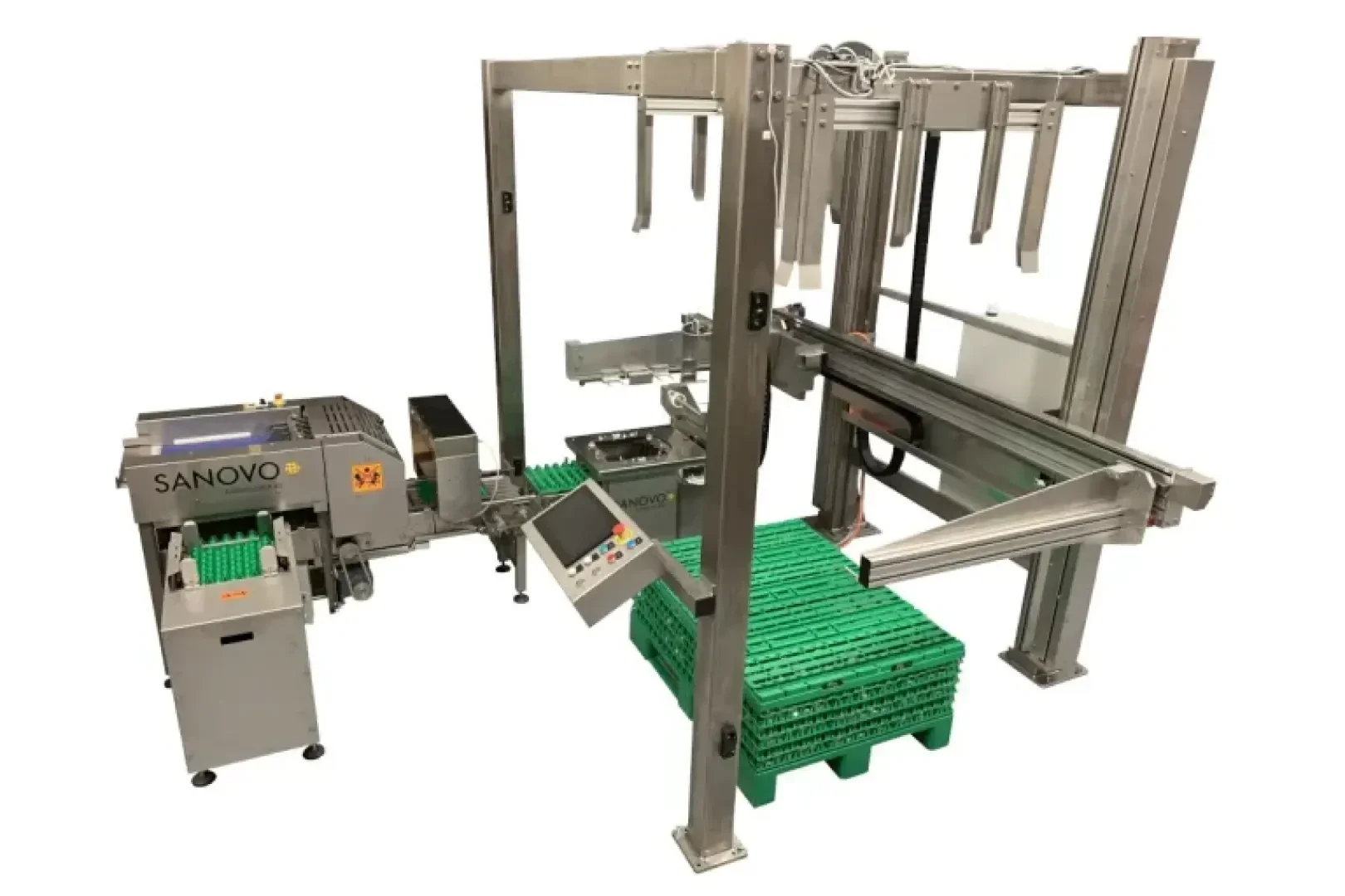 Eine industrielle Palettiesiermaschine von Nuovo mit Metallrahmen, Förderbändern und gestapelten Eierhöcker auf Paletten